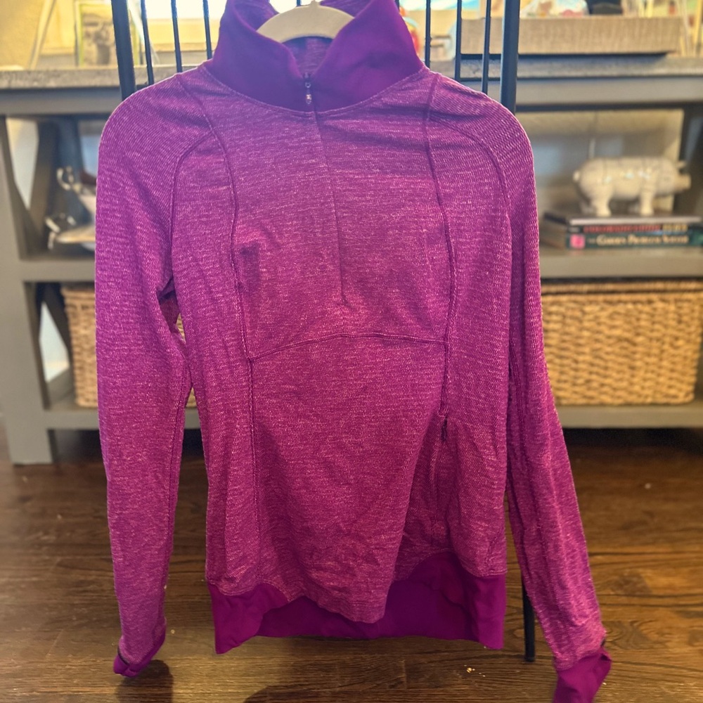 Size 8 lululemon quarter zip long sleeve in pretty magenta.